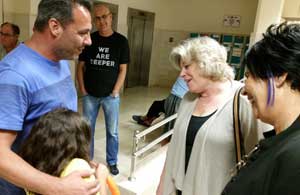 Federation CJA CEO Deborah Corber visits an Israeli soldier and his family at Soroka Hospital in Beer Sheva.